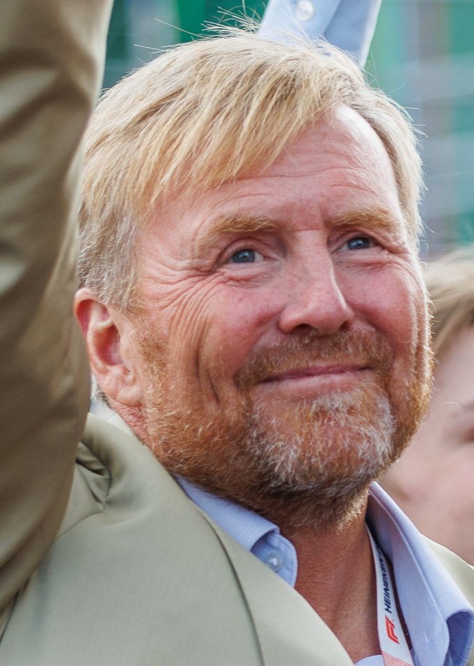 Le roi Willem-Alexander des Pays-Bas, sourire, lors d'une rencontre publique