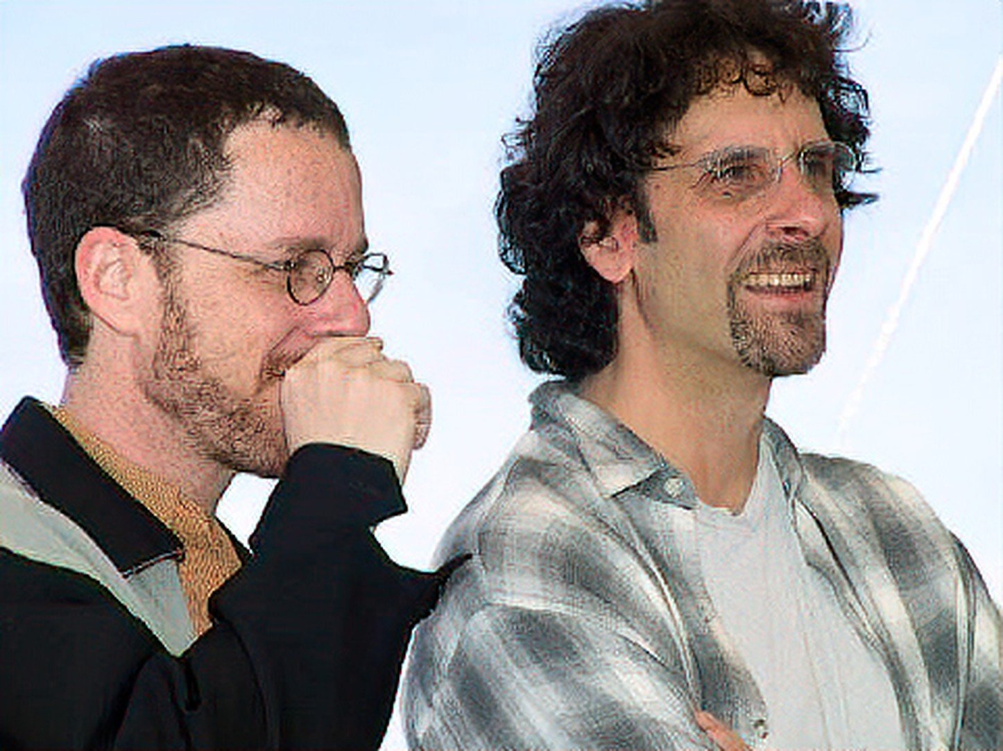 Portrait des frères Joel et Ethan Coen, cinéastes américains, souriants
